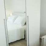Toni *